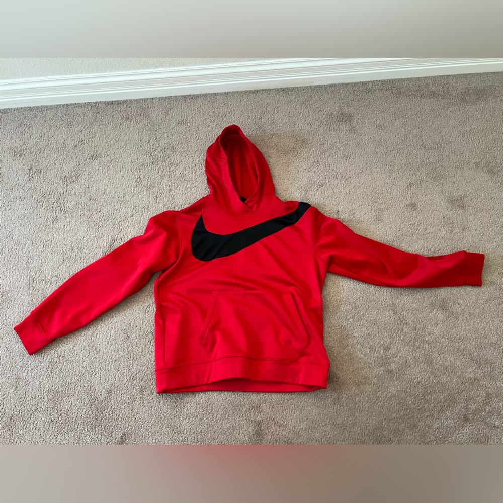 Nike sweater with hood dry fit and very warm. Gently used once